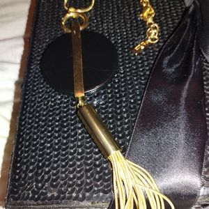 Trina Turk gold and black geometric shape necklace with gold Fringe